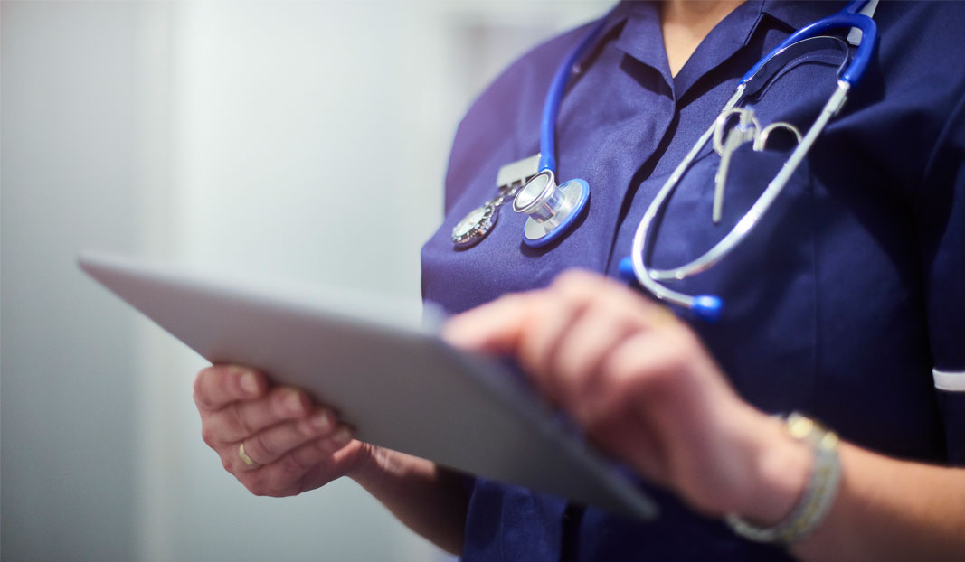 Photo of a nurse holding a clipboard